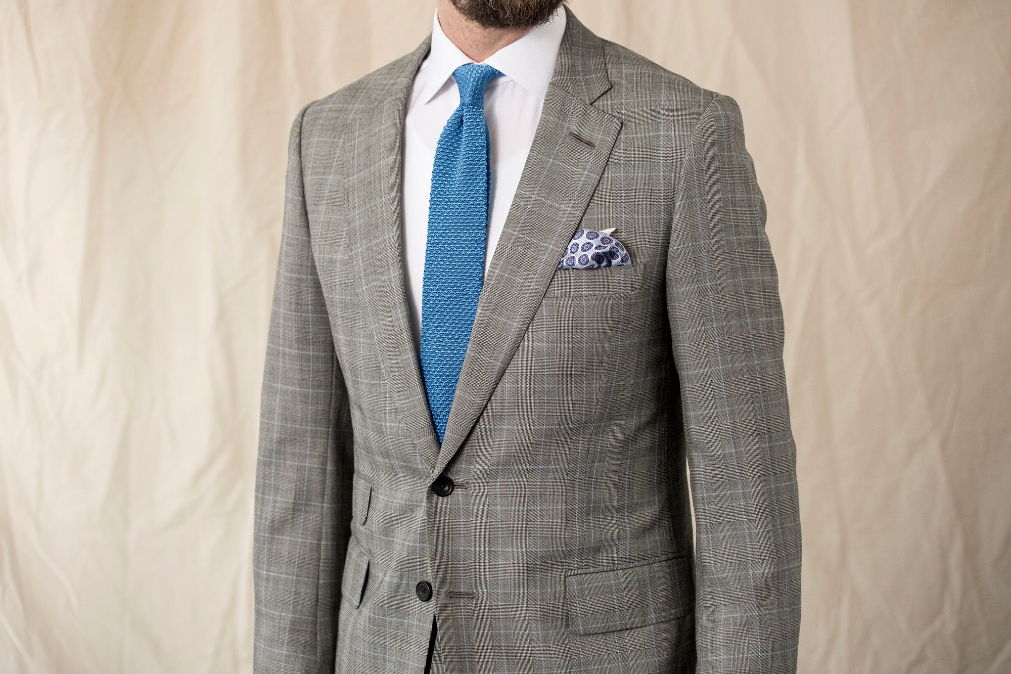 Introducing our Blue Knitted Tie & White Medallion Pocket Square Set
